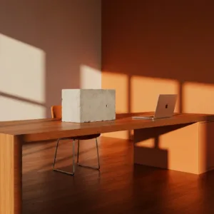 A minimalist workspace with a sleek wooden desk. On the desk, a heavy, brutalist concrete block sits next to a modern laptop, symbolizing a 'load-bearing anchor' in a daily routine. Soft, natural morning light casting sharp, intentional shadows across the room. High resolution, photorealistic, cinematic lighting.